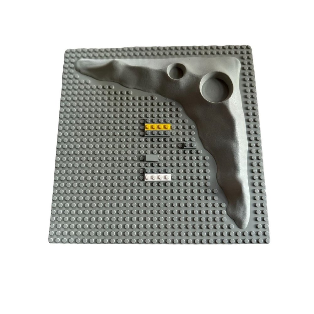Lego Gray Baseplate with Yellow, Black, and White Pieces